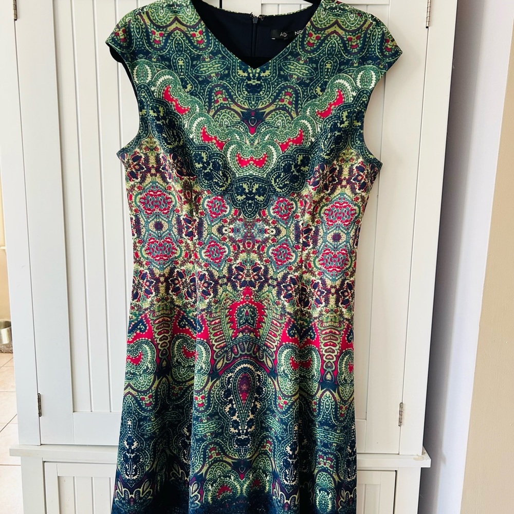 Dress. Beautiful details and colors for people who like rich color